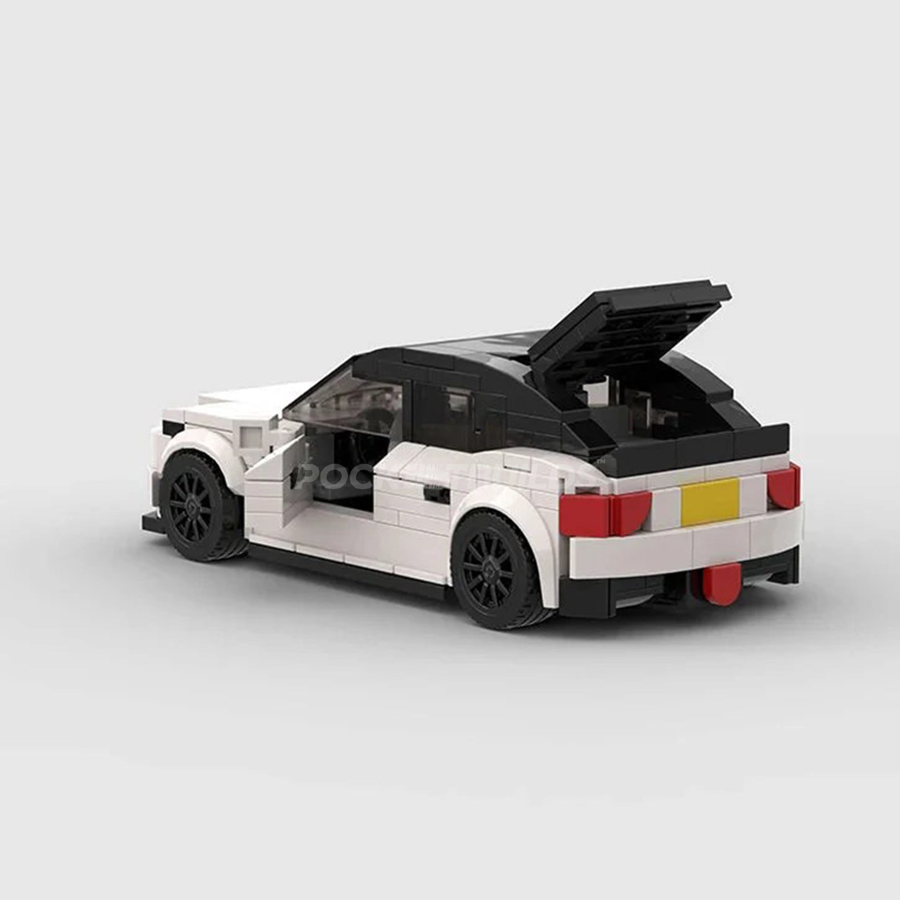 Tesla Model 3 y estación de carga